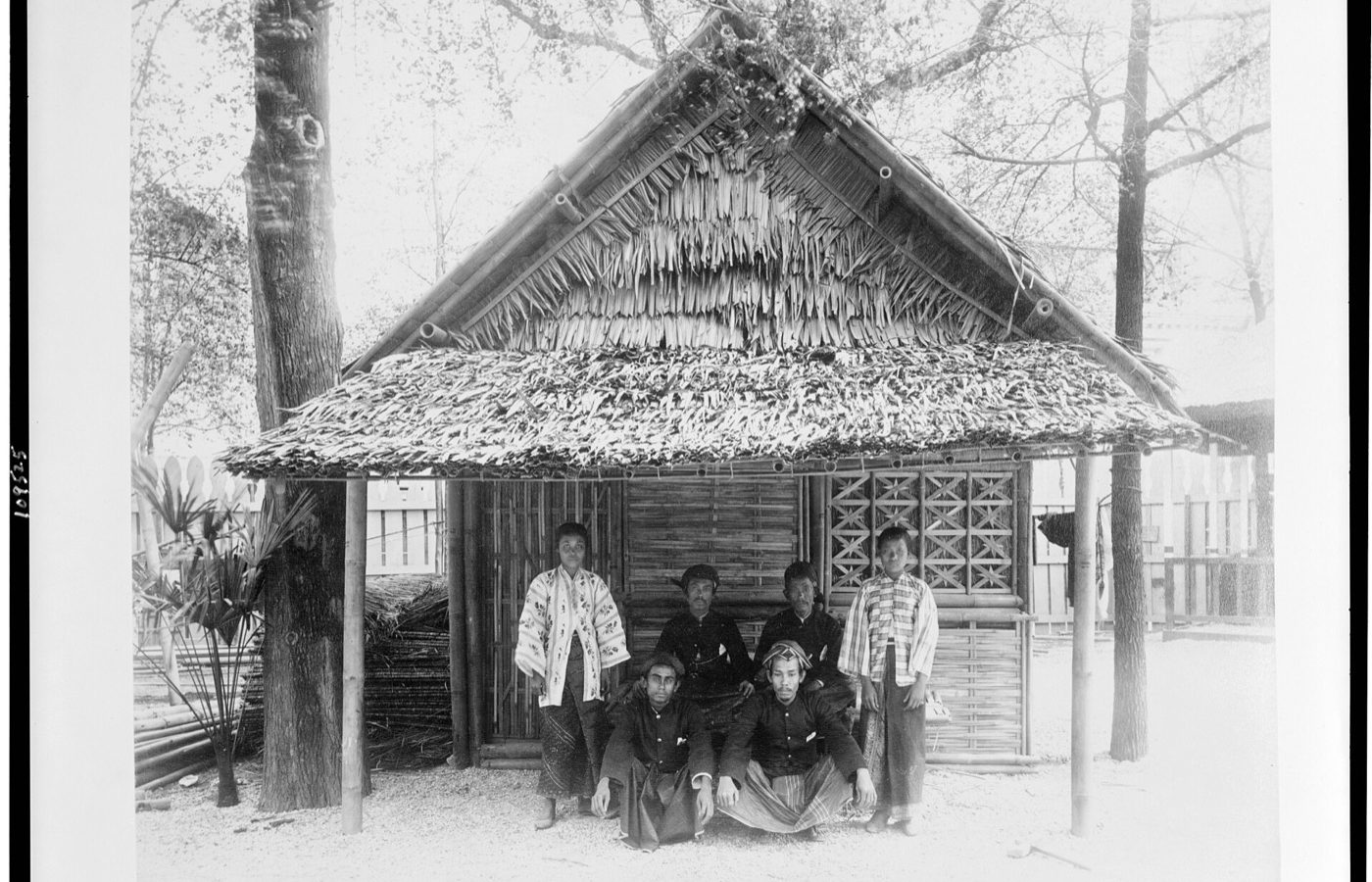 Title: Six people posed before Javanese house in Javanese Village, Paris Exposition, 1889 Abstract/medium: 1 photographic print : albumen.